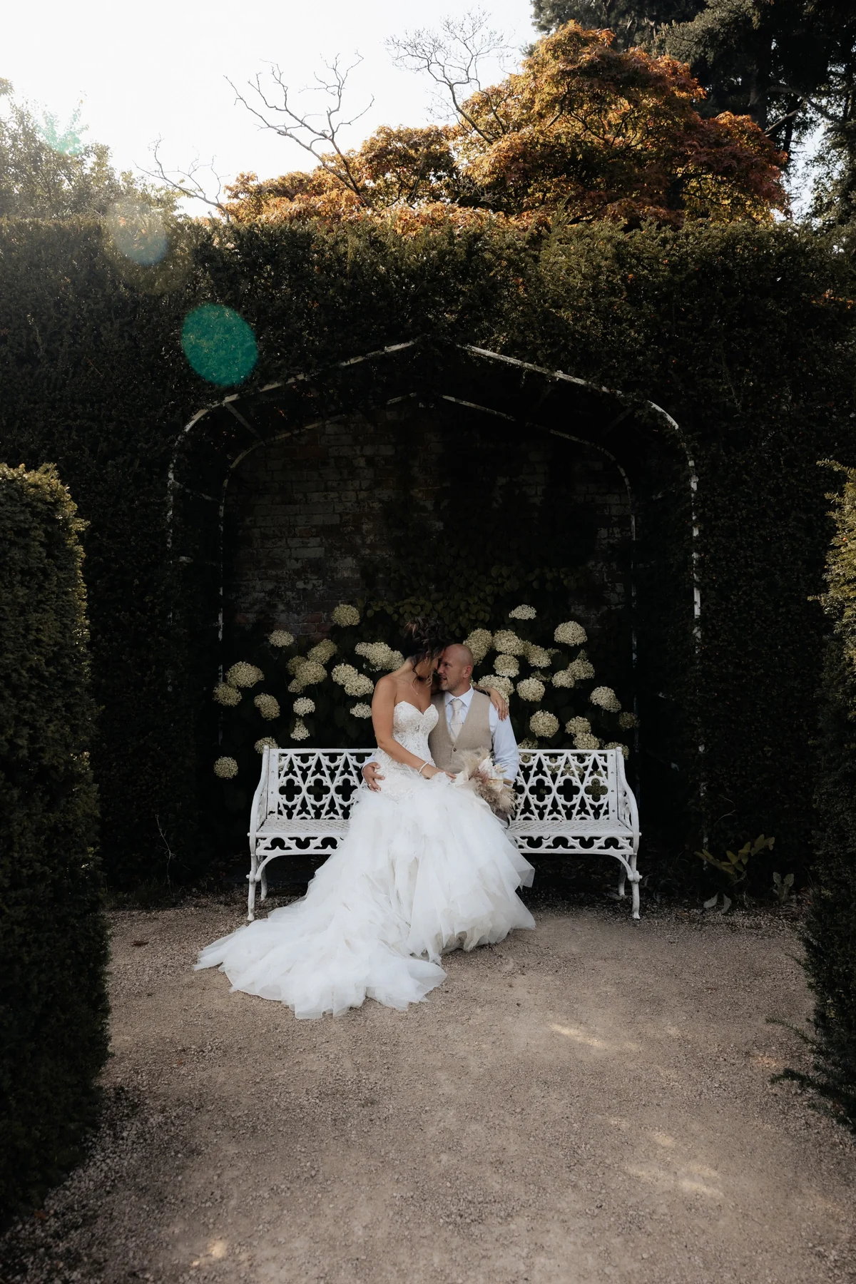 A bride in a sunlit garden