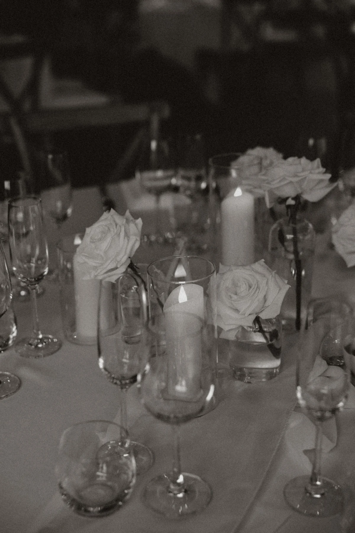 An elegantly set wedding table with flowers and candles