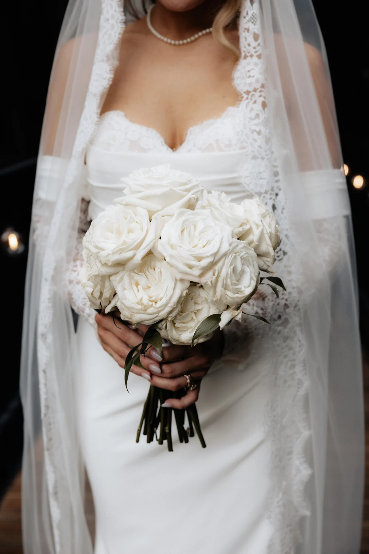 A bridal bouquet and lace details